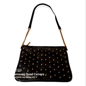 Express purse crossbody black vintage gold studded chain and leather strap.